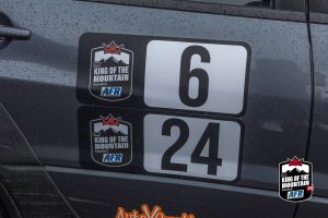 A car with a number on the side of it.